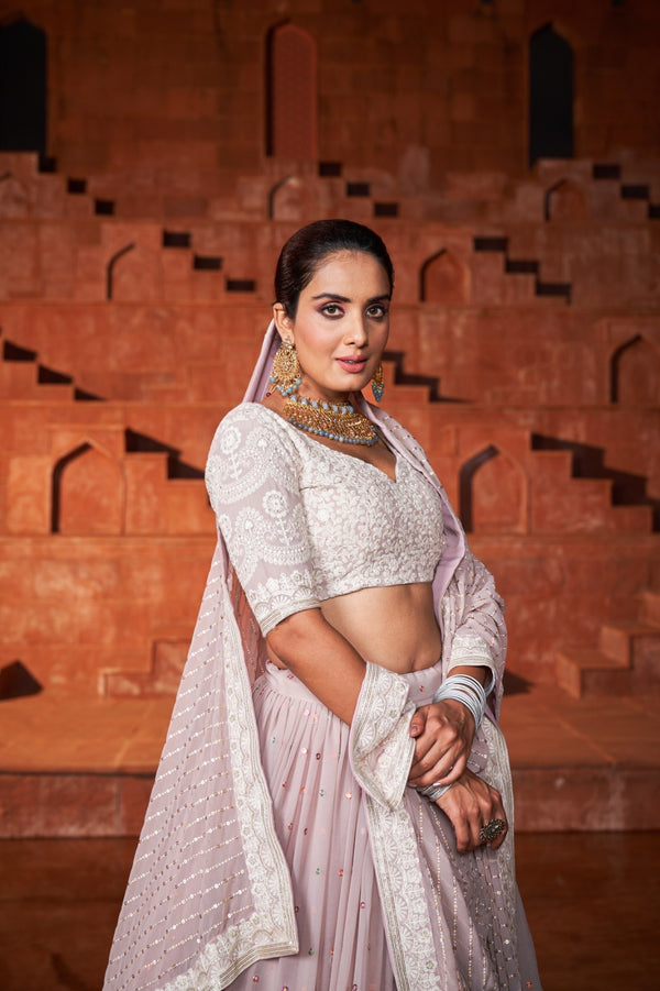 Breathing in a ton of cultural hues and ethnicities,  presence of Elegant in our designer lehenga, It’s a perfect piece to take as bride'smade look for you