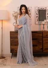 Presenting Shimmer Fabric Designer Saree With Fancy Thread Work And Sequence