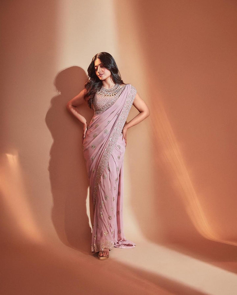 PRESENTING FAUX GEORGETTE DESIGNER SAREE WITH EXCLUSIVE HAND CRAFTED BLOUSE