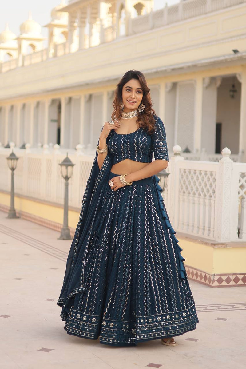 Without Blink Select this Designer Lehenga collection Made with Faux Blooming With Sequins And thread Embroidered work Lehenga Choli with Dupatta