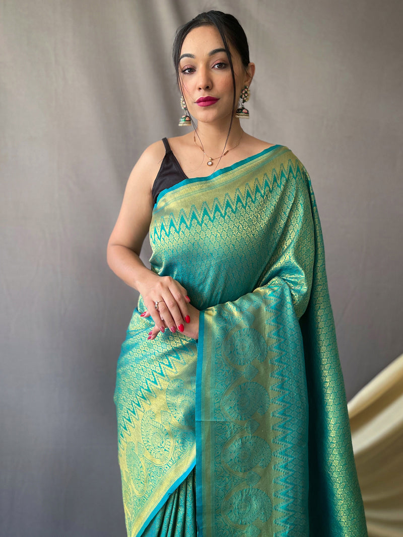 This beautiful Kanjeevaram Silk is having original pure zari woven motif weaves all over the body of the saree having gold zari woven broad border and crafted with elegant Pallu.