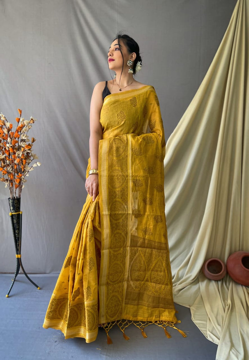 Cotton Sarees with Gold Zari Weaving Border having Beautiful Motifs all over. Rich Weaving Gold Zari Pallu Paired with Brocade Weaving Blouse.