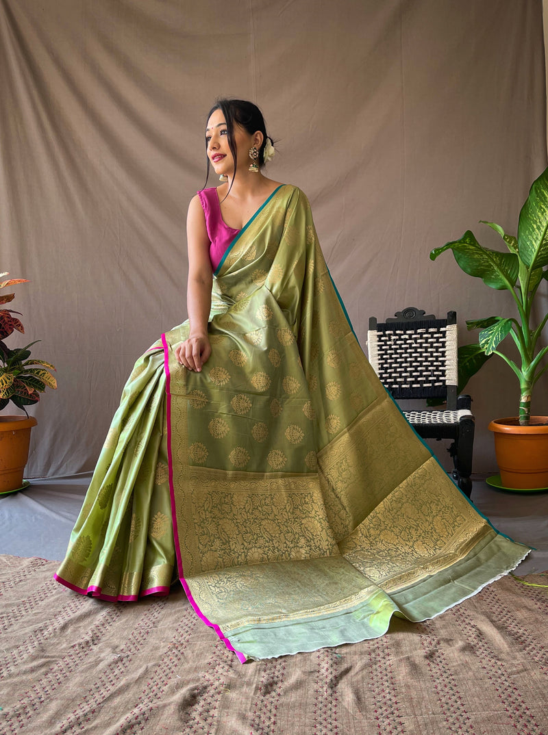 Two Toned Soft Silk Sarees with Golden Zari Weaving Motifs all over with Zari Border . Rich Weaving Golden Zari Pallu Paired with Unstitched Brocade Blouse.