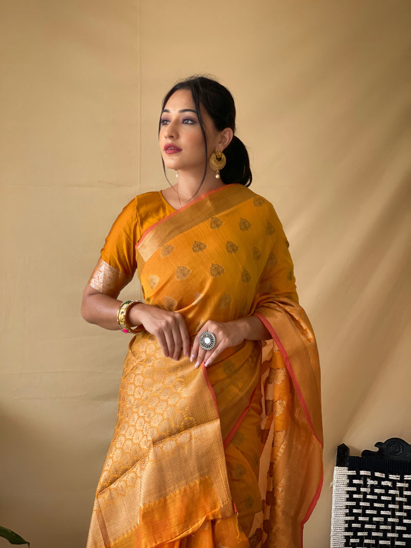 This beautiful Cotton saree is having copper woven motif weaves all over the body, having copper zari woven border and crafted with elegant Pallu.