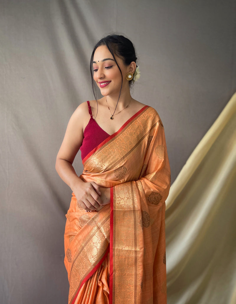 Cotton Sarees with Gold Zari Weaving Motifs all over having Beautiful Motifs all over. Rich Weaving Gold Zari Beautifully Designed Pallu. Paired with Brocade Weaving Blouse.