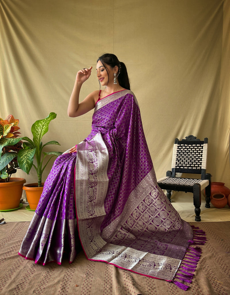 Khicha checks saree with Exquisite patterns and design . The border of  saree is broad and embellished with alluring motifs. saree with rich pallu and attractive border