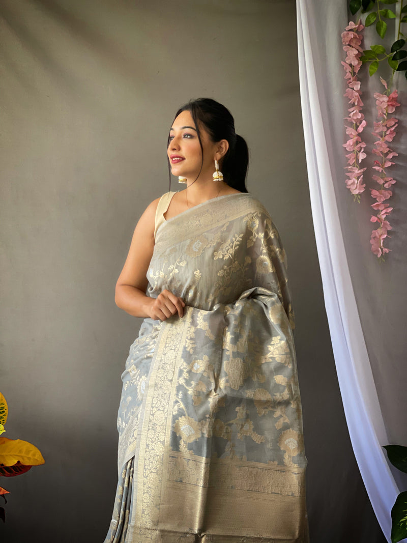Linen Silk Sarees with Gold and Silver Zari Jaal Weaves all over, crafted with Zari Border and Rich Designed Weaving Pallu. Paired withÂ Unstitched Plain Blouse