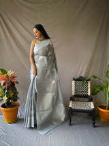 Linen Silk Sarees with Silver Zari Weaving Leaf Motifs. Rich Weaving Pallu. Paired with Unstitched Brocade Blouse