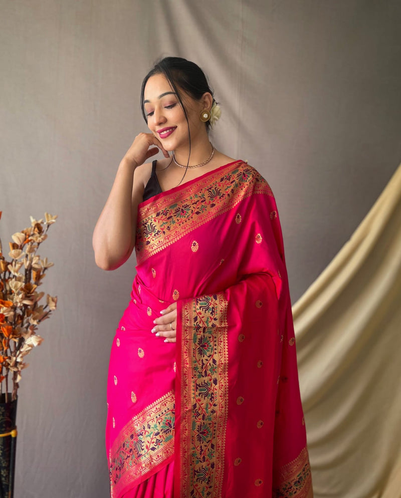 This beautiful Paithani Soft Silk saree is having gold zari woven motifs all over the body of the saree , having gold with meenakari zari woven border and crafted with Rich Paithani woven Pallu.