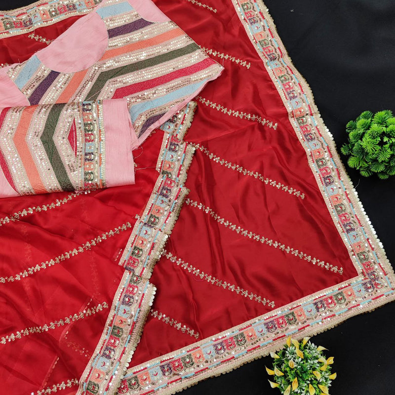 Sleek and sophisticated, this fiery Rangoli saree with beautifully embroidered body and border in sequence and Dori is an epitome of classic elegance Designer saree