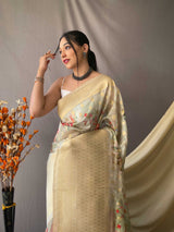 Kora Silk Woven with Zari Motifs All Over The Body Having Floral Prints All Over The Saree. Rich Weaving Pallu