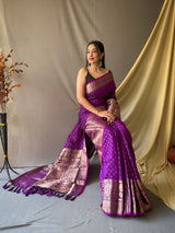 This Beautiful Soft Silk Saree Is Having Checks Silver And Gold Zari Weaves All Over The Body Of Saree, Having Gold Zari Woven Broad Border And Crafted With Elegant Pallu.