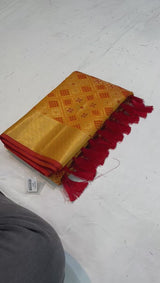 This beautiful Patola silk saree is having elegant meenakari bandhej weaves all over the body of saree, having gold zari decent woven border and crafted with elegant Zari Woven Pallu.